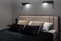 Posteľ alebo postele v izbe v ubytovaní Lavoo Boutique Apartments