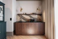 Kuchyňa alebo kuchynka v ubytovaní Lavoo Boutique Apartments
