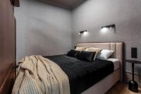 Posteľ alebo postele v izbe v ubytovaní Lavoo Boutique Apartments