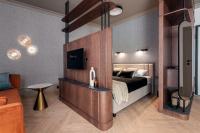 Posteľ alebo postele v izbe v ubytovaní Lavoo Boutique Apartments