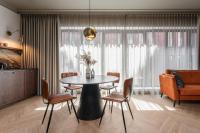 Posedenie v ubytovaní Lavoo Boutique Apartments