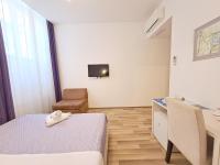 Posteľ alebo postele v izbe v ubytovaní Medulić Palace Rooms & Apartments