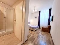 Posteľ alebo postele v izbe v ubytovaní Medulić Palace Rooms & Apartments