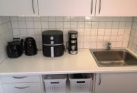 Kuchyň nebo kuchyňský kout v ubytování H&M Homes Apartments