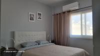 Postel nebo postele na pokoji v ubytování Beach apartment's