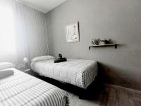 Postel nebo postele na pokoji v ubytování Apartamento Victoria