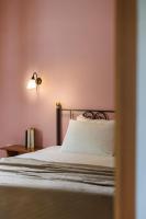 Posteľ alebo postele v izbe v ubytovaní Nemorosa Holiday Houses