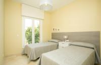 Villas Altos De Marbellaにあるベッド