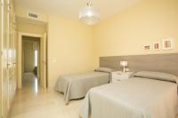 Villas Altos De Marbellaにあるベッド