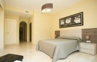 Villas Altos De Marbellaにあるベッド