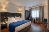 Postel nebo postele na pokoji v ubytování BW Izmir Hotel
