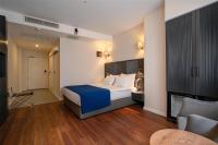 Postel nebo postele na pokoji v ubytování BW Izmir Hotel