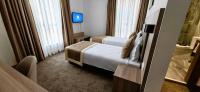Postel nebo postele na pokoji v ubytování Evelin Deluxe House