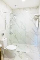 Koupelna v ubytování Evelin Deluxe House
