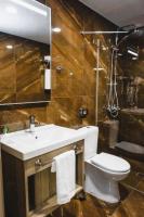 Koupelna v ubytování Evelin Deluxe House