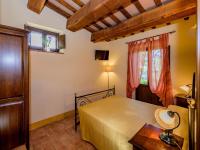 A bed or beds in a room at Gorgeous Apartment with Pool near Sibillini Mountains
