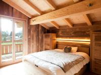 Posteľ alebo postele v izbe v ubytovaní Chalet d'exception à Chamonix avec sauna, cheminée et proximité des pistes skiables - FR-1-343-181