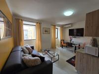 Televízia a/alebo spoločenská miestnosť v ubytovaní Guesthouse Korzo