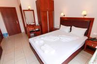 A bed or beds in a room at Smaro Studios
