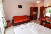 A bed or beds in a room at Smaro Studios
