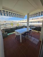 Balkón nebo terasa v ubytování Superbe appartement avec solarium et piscine communautaire