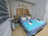 Postel nebo postele na pokoji v ubytování Superbe appartement avec solarium et piscine communautaire