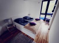 Posteľ alebo postele v izbe v ubytovaní Apartament Gwiazda Perła Krynicy
