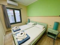 Posteľ alebo postele v izbe v ubytovaní Casa Mersini