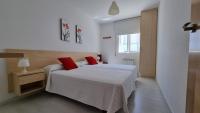 Postel nebo postele na pokoji v ubytování Apartamento Playa De Lariño