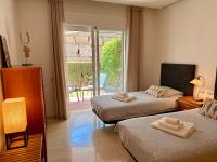 Postel nebo postele na pokoji v ubytování Beautiful luxurious 2 bedroom apartment with a breathtaking view at La Cala Golf