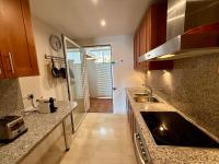 Kuchyň nebo kuchyňský kout v ubytování Beautiful luxurious 2 bedroom apartment with a breathtaking view at La Cala Golf