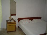 Posteľ alebo postele v izbe v ubytovaní Apartmani Lukin
