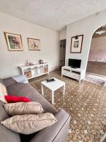 Televízia a/alebo spoločenská miestnosť v ubytovaní Casa vista Saint Vincent accanto alle Terme