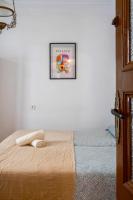 Posteľ alebo postele v izbe v ubytovaní Vintage Flat Malaga