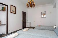 Posteľ alebo postele v izbe v ubytovaní Vintage Flat Malaga