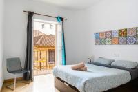 Posteľ alebo postele v izbe v ubytovaní Vintage Flat Malaga
