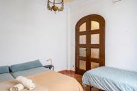 Posteľ alebo postele v izbe v ubytovaní Vintage Flat Malaga