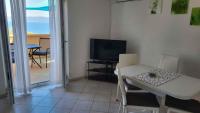 Televízia a/alebo spoločenská miestnosť v ubytovaní Apartment in Ravni/Istrien 8872