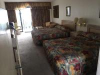 Ein Bett oder Betten in einem Zimmer der Unterkunft David&#39;s Landing