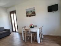 A television and/or entertainment centre at Passi Alterni Apartments
