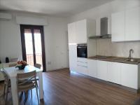 A kitchen or kitchenette at Passi Alterni Apartments