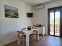A television and/or entertainment centre at Passi Alterni Apartments