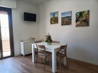 A television and/or entertainment centre at Passi Alterni Apartments