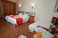 Postel nebo postele na pokoji v ubytování Hotel La Bodega