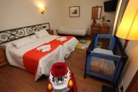 Postel nebo postele na pokoji v ubytování Hotel La Bodega