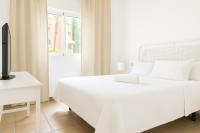 Postel nebo postele na pokoji v ubytování Villa 9 La Alzambra-Puerto Banus