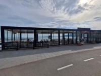 een gebouw aan de kant van een weg bij Sea View Apartment C 514 in Balchik