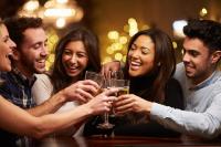 a group of people holding glasses of champagne at Acacia Snowy Motel in Jindabyne