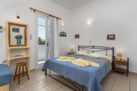 Posteľ alebo postele v izbe v ubytovaní Apollon Rooms