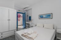 Posteľ alebo postele v izbe v ubytovaní Apollon Rooms